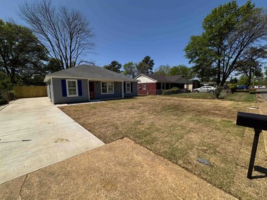 Ranch-style house with driveway