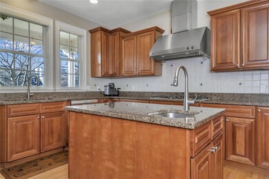 Convenient center island offers workspace, cabinet