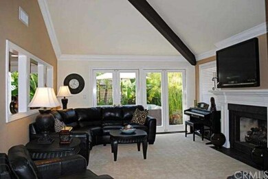 Open floor plan with custom French doors to the pa