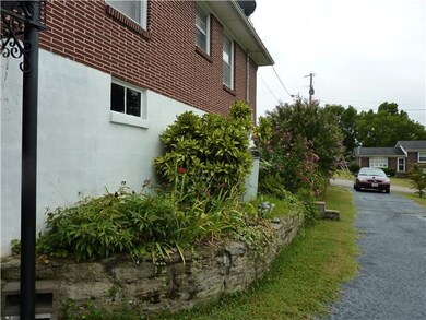 Driveway side of home.