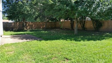 Back yard with nice, solid privacy fence!