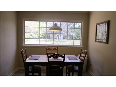 Breakfast Room overlooking back yard with large di