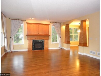 Large living room with gas burning fireplace.  Lot