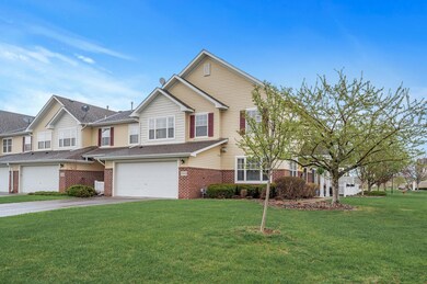 Corner unit with side patio and sitting on a pond