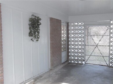 View of breezeway between house and garage.  It is