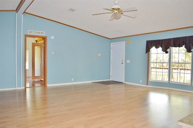 Living room showing door to Master Bedroom
