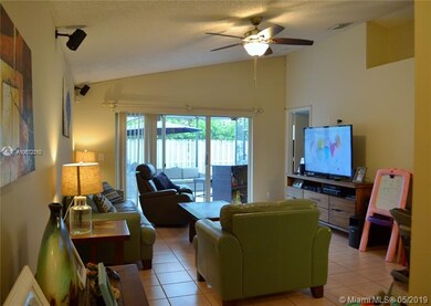 Entrance into family room features vaulted ceiling