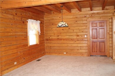 This is the dining room with an outside entrance f