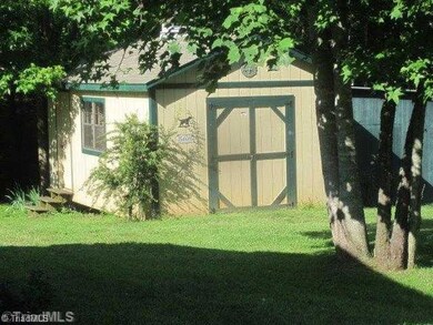 Workshop. Wired work shop with a tractor shed