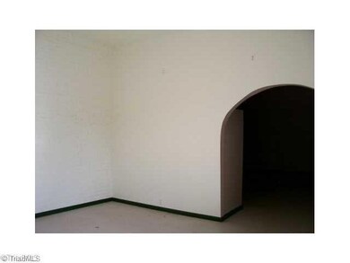 Executive Office/Suite. Unit 1. Back area. 2-Office Suite. Front office. Side entrance. Tiled floor. Drywall.