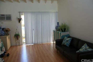 Spacious living room & balcony though the double d