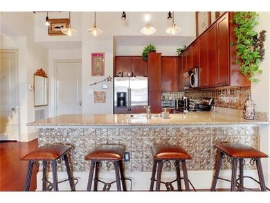 View of kitchen from living area.