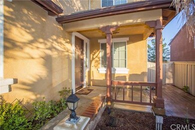 Enjoy evenings in this hardscaped front porch, all