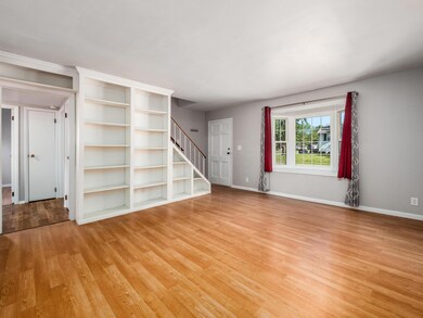 Living Room w/ built in bookcases