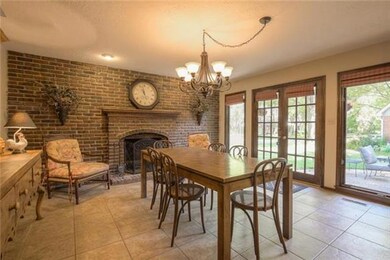 Cozy hearth room with lots of natural light and wo