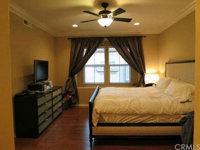 Master Bedroom with ceiling fans.  (furnishings do