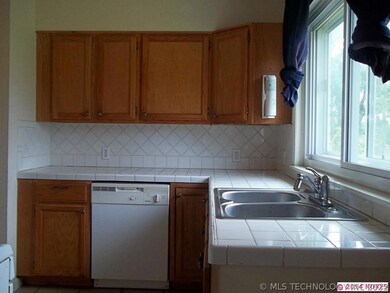Ample counter space featuring stainless steel sink