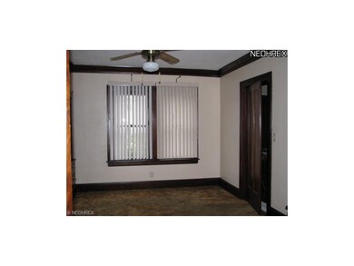 Formal Dining Room.  Carpet over Oak Hardwood Floo