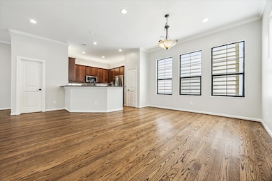 Hardwood floors and fresh paint throughout make th