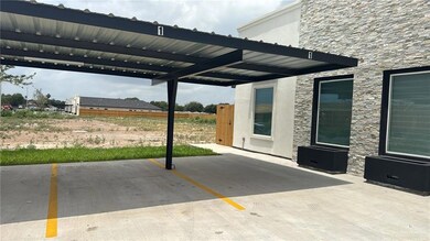 Convenient covered carport provides sheltered parking right at the entrance.