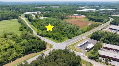 Drone / aerial view of a heavily wooded area