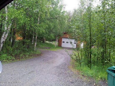 view of garage shop from road