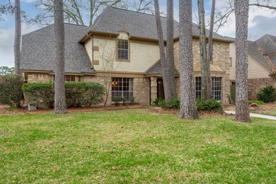 Mature trees and amazing landscaping highlight this corner lot.