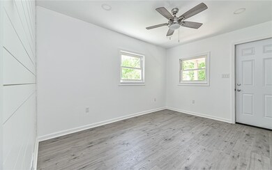 Living room features recessed lighting and ceiling