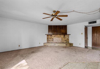 Unfurnished living room featuring a fireplace, cei