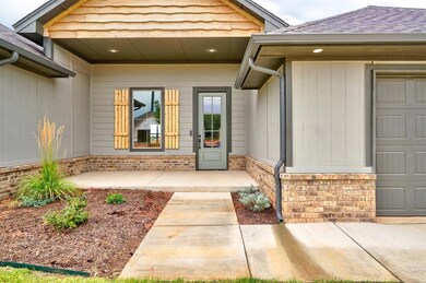 Entrance to property featuring a garage