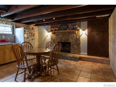 Massive Stone Fireplace! Exposed brick walls! Must