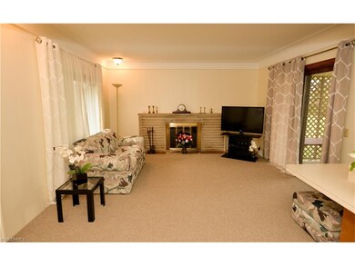 COZY FAMILY ROOM WITH SLIDERS TO PATIO
