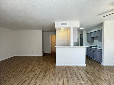 Step inside to this REMODELED unit with NEW wood-l