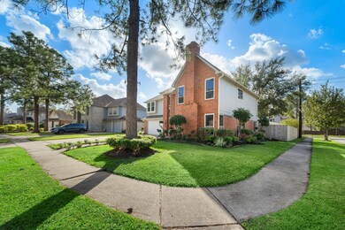 This spacious corner lot offers additional privacy