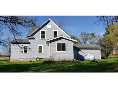 Rear of home showing main level bedroom.