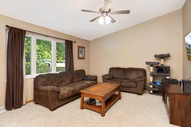 Main level living room with vaulted ceilings