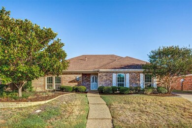 Beautiful curb appeal.  Driveway is on the right w