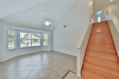 View From Front Entry to Real Wood Stairs and Comf