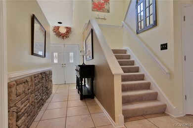 First floor hall with stone accents.