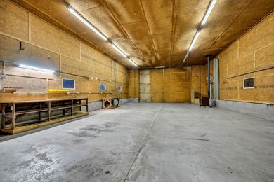 Worktables, Wood burning Stove & separate 220 service.