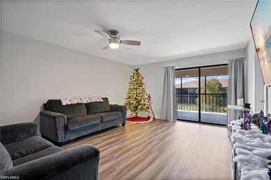 Living room featuring light hardwood / wood-style 