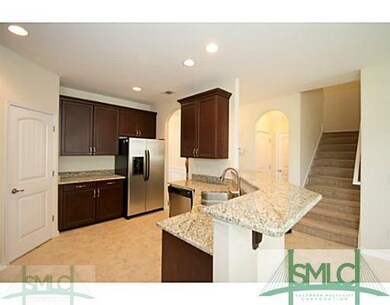 Kitchen. GO UPSTAIRS FOR 3 BEDROOMS, OFFICE, LOFT/