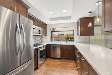 Beautiful remodeled kitchen with stainless steel appliances.