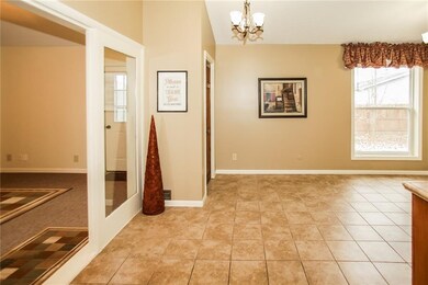 Wonderful space for a table in the kitchen just off the three season room!