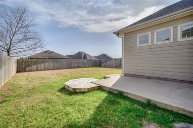 View of yard with a patio and a fenced backyard