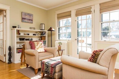 Living room with door to front deck