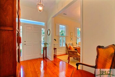 The dining room is directly through the cased open