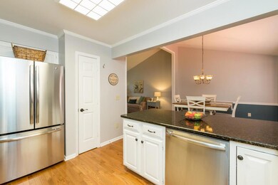kitchen open to dining room with counter area.
