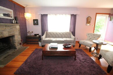 Living room with woodburning fireplace