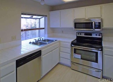 Bright kitchen with brand new high-end stainless s